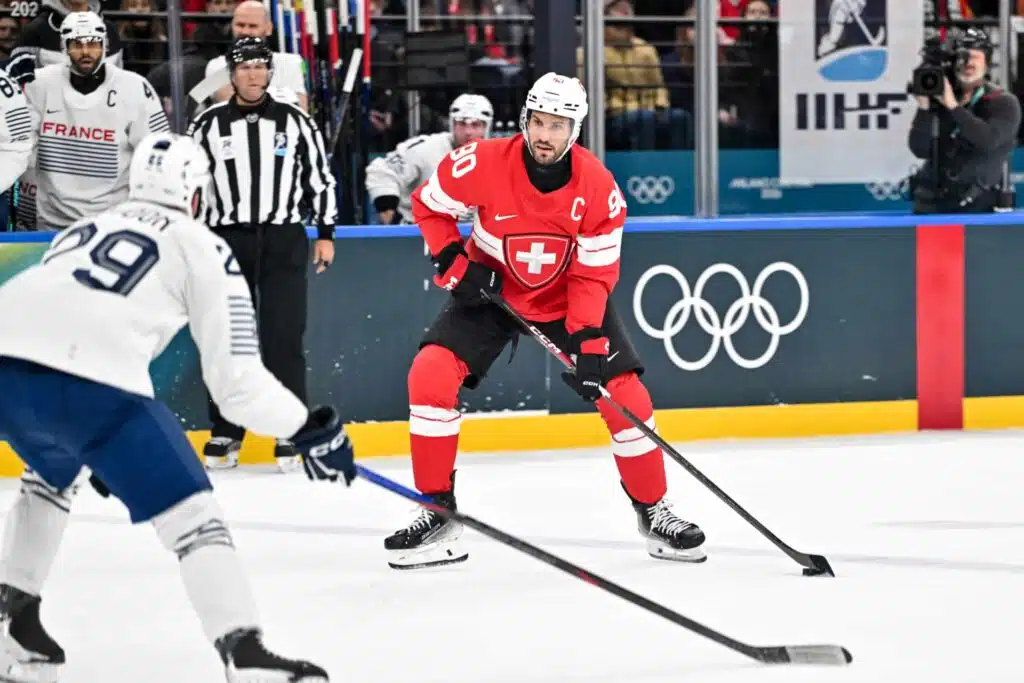 Olympiakiekko: Jukka Jalosen Italia Leijonien kitaan puolivälierään? - Sveitsi joutuu ahtaalle Olympiakiekko: Jukka Jalosen Italia Leijonien kitaan puolivälierään? – Sveitsi joutuu ahtaalle